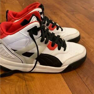 Puma basketball shoes.  Worn one basketball season indoor court only.  Leather.